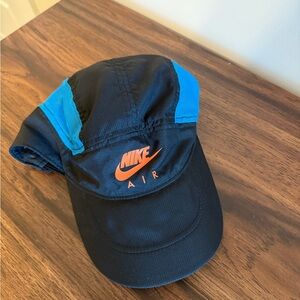 Nike Men's Black and Blue Cap with Orange Logo
